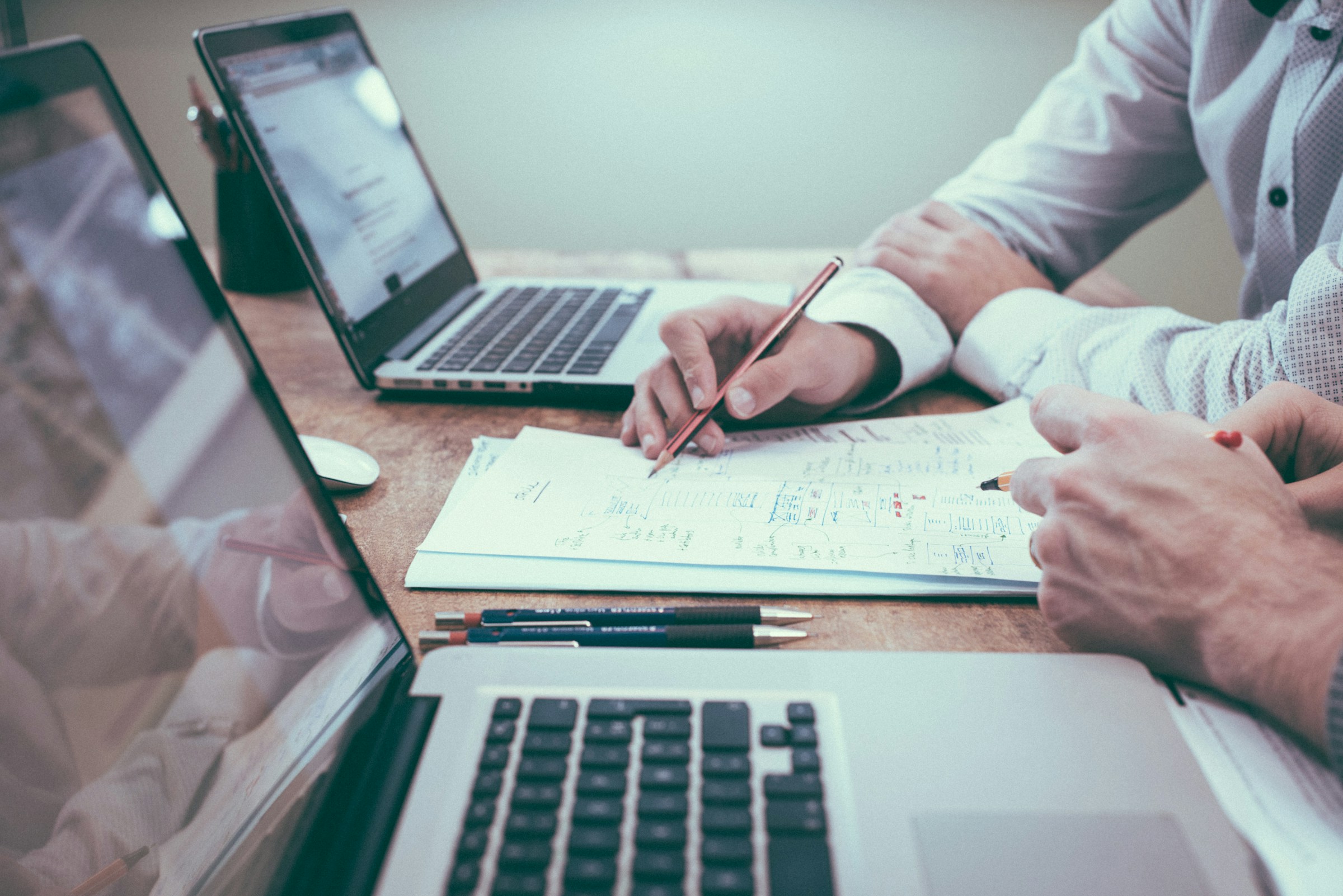 Tax professionals reviewing financial documents